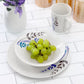 Gibson Blue Leaves 12 Piece Round White Ceramic Dinnerware Set for 4