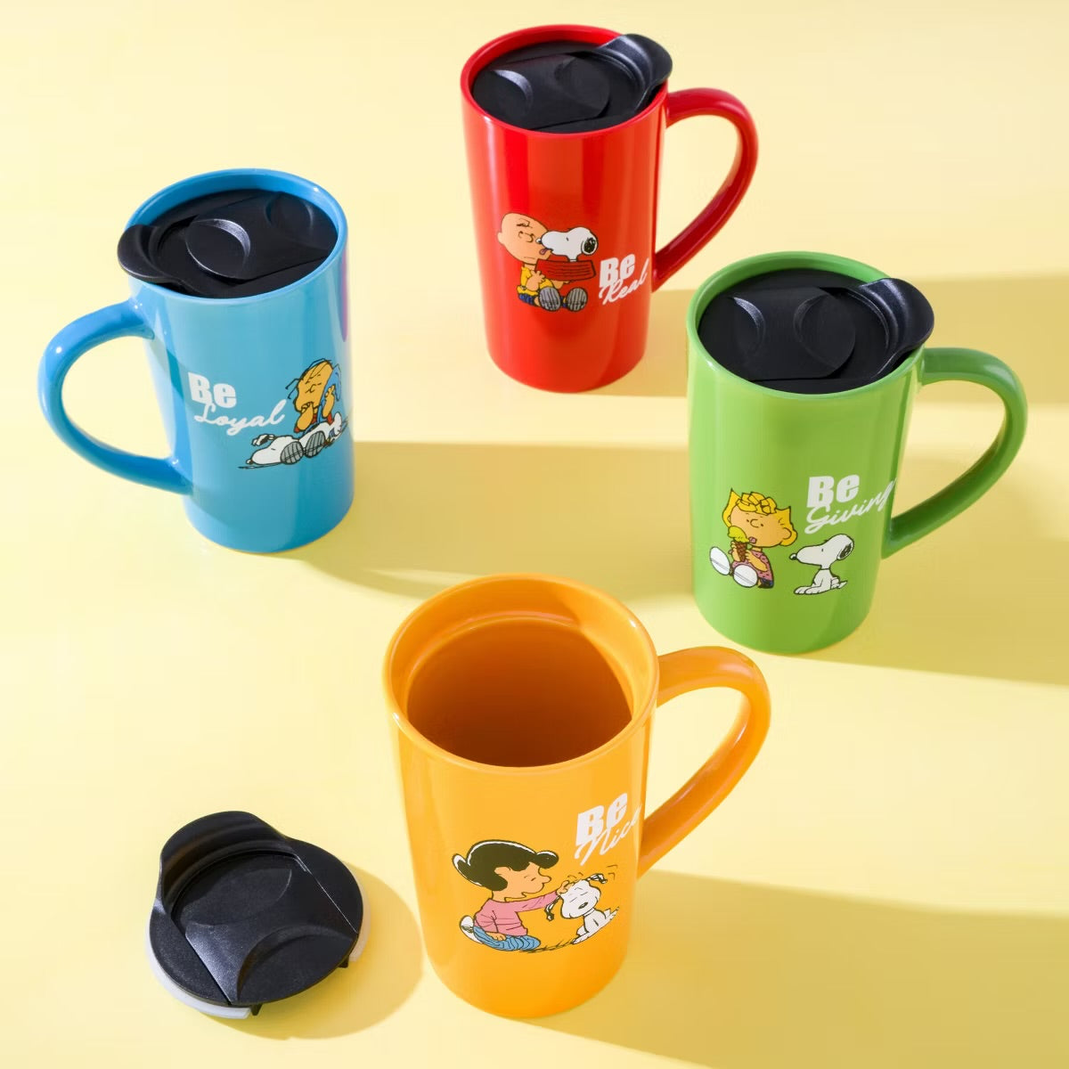 Peanuts Gentle Reminders Stoneware 4 Piece 18 oz Travel Cups in Assorted Designs