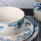 Elama Traditional Blue Rose 16 Piece Round White Floral Stoneware Dinnerware Set