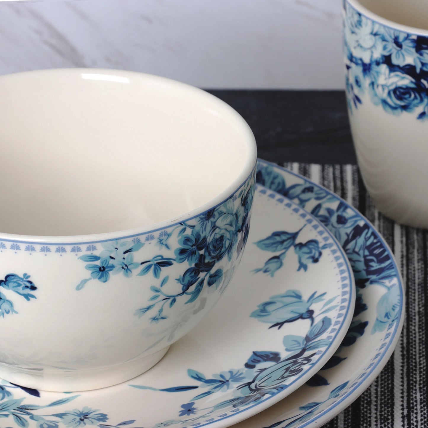 Elama Traditional Blue Rose 16 Piece Round White Floral Stoneware Dinnerware Set