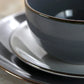 Elama Tahitian Grand 16 Piece Stoneware Dinnerware Set for 4 in Gray High Gloss